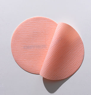 Flexible abrasive film discs and sheets designed for contour and concave surface sanding on vehicle parts.