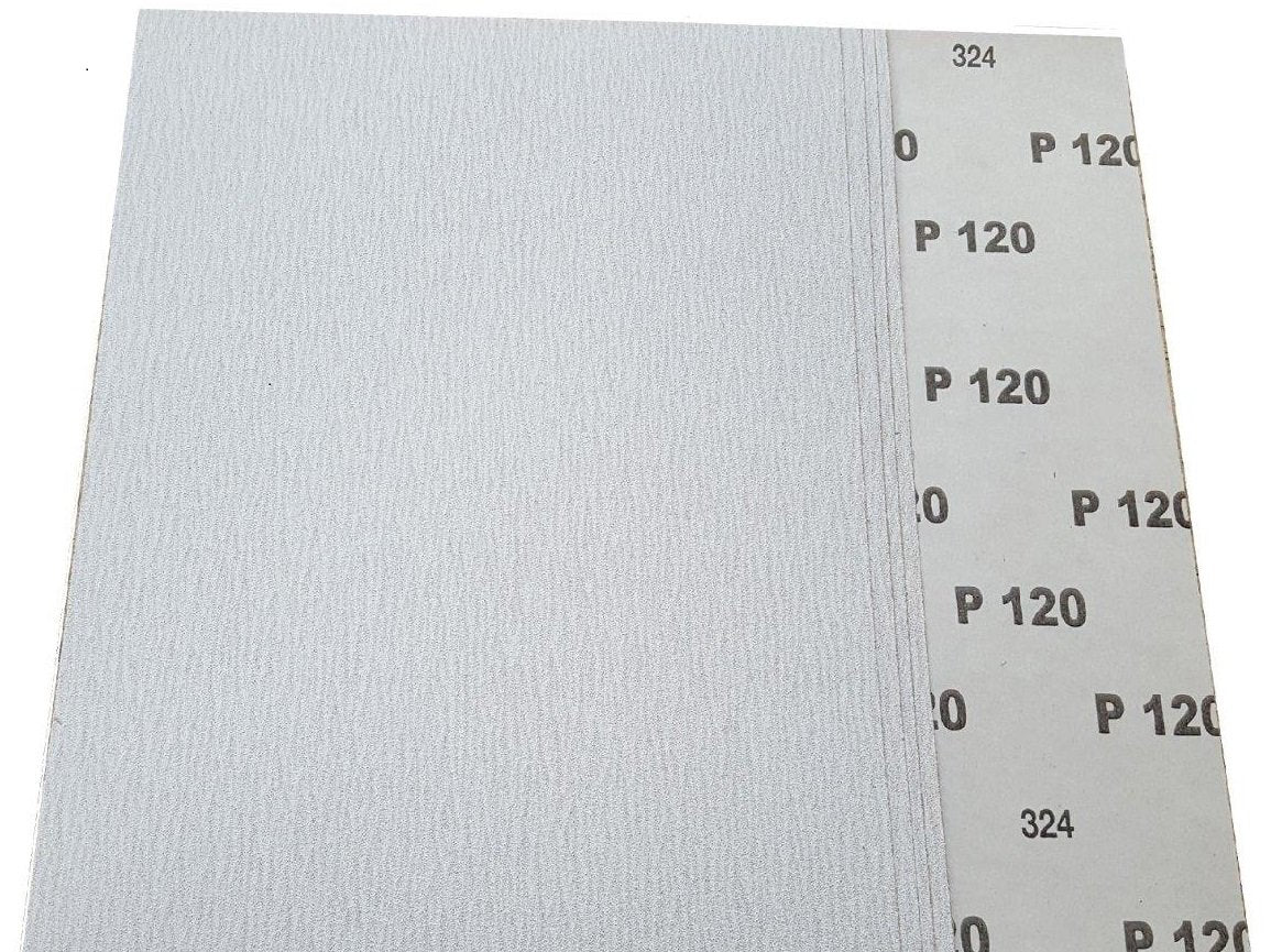 Alt text: Stack of 9x11 sanding sheets in various types including aluminum oxide and silicon carbide, suitable for multiple applications.